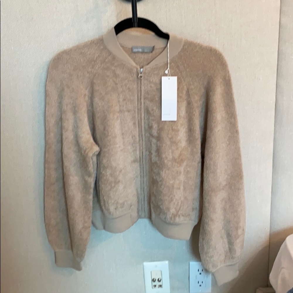 Sweater zipped up